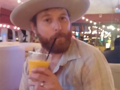 Guest at the bar with a drink