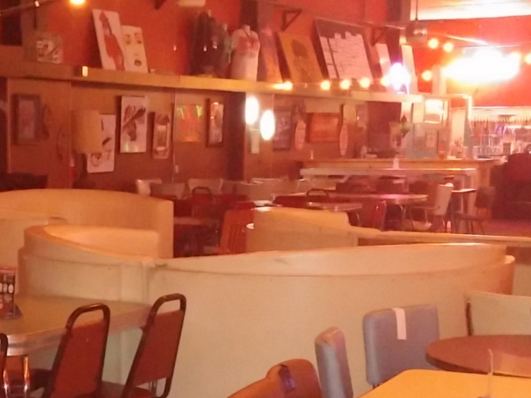 Inside Fifi's lounge with retro booths