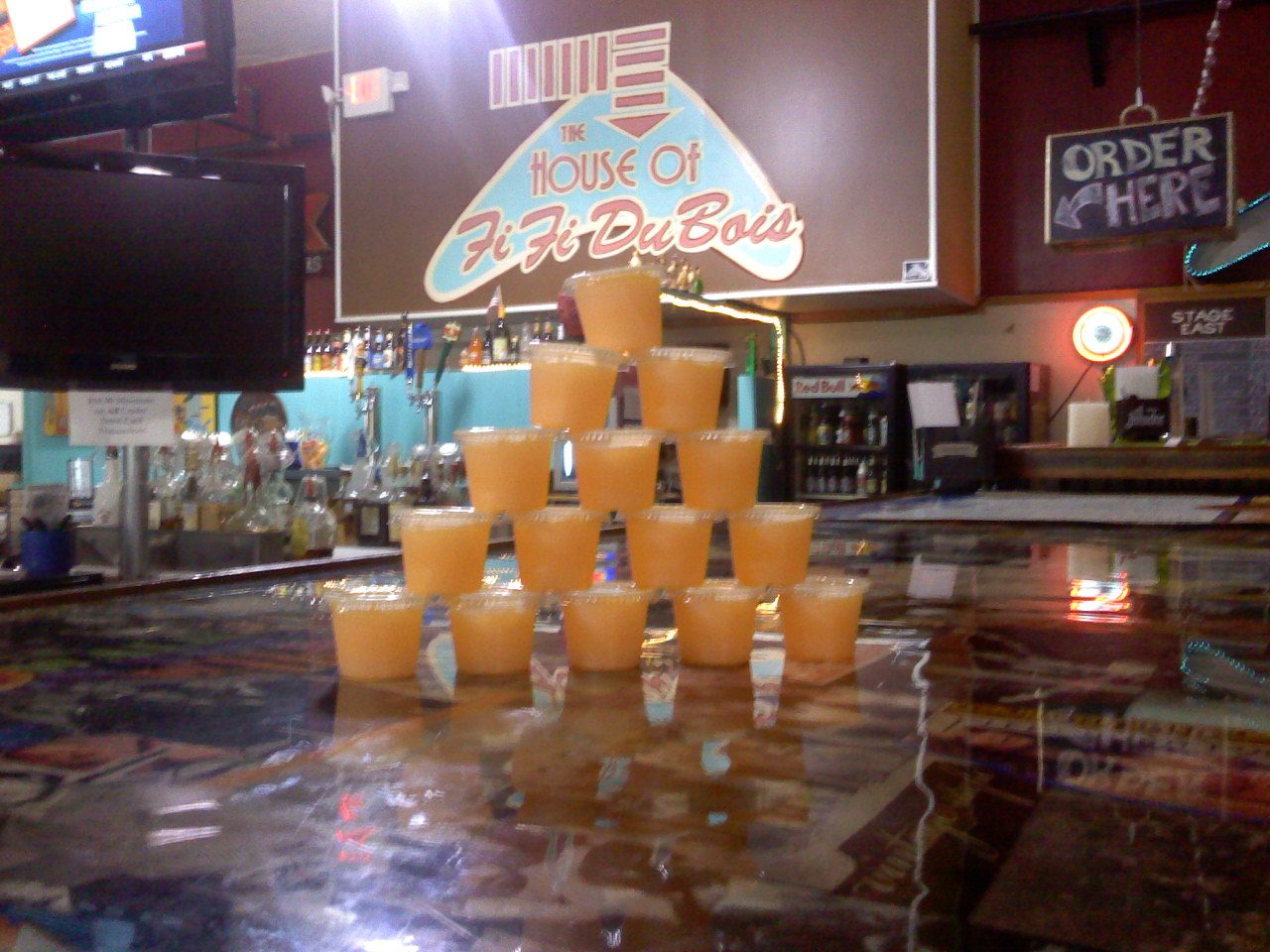 Jello shots lined up on the bar